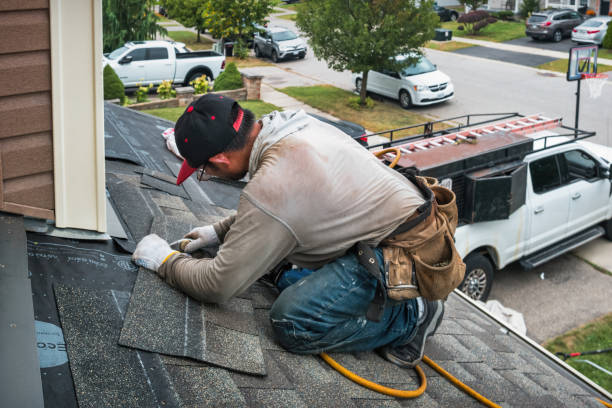 Professional Roof Repair technician working in West Falmouth, MA